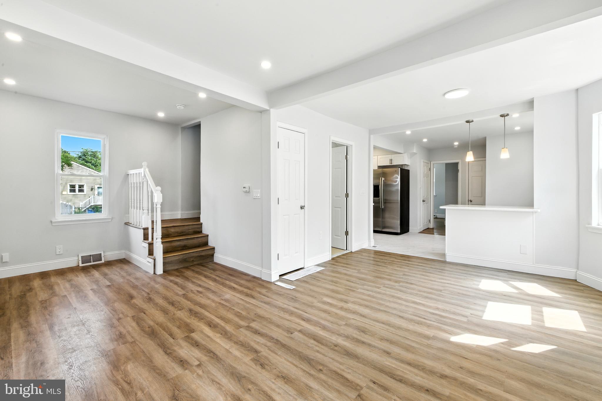 403 South Lenola Road Moorestown, NJ 08057 - Photo 5 of 26 a view of a big room with wooden floor and windows