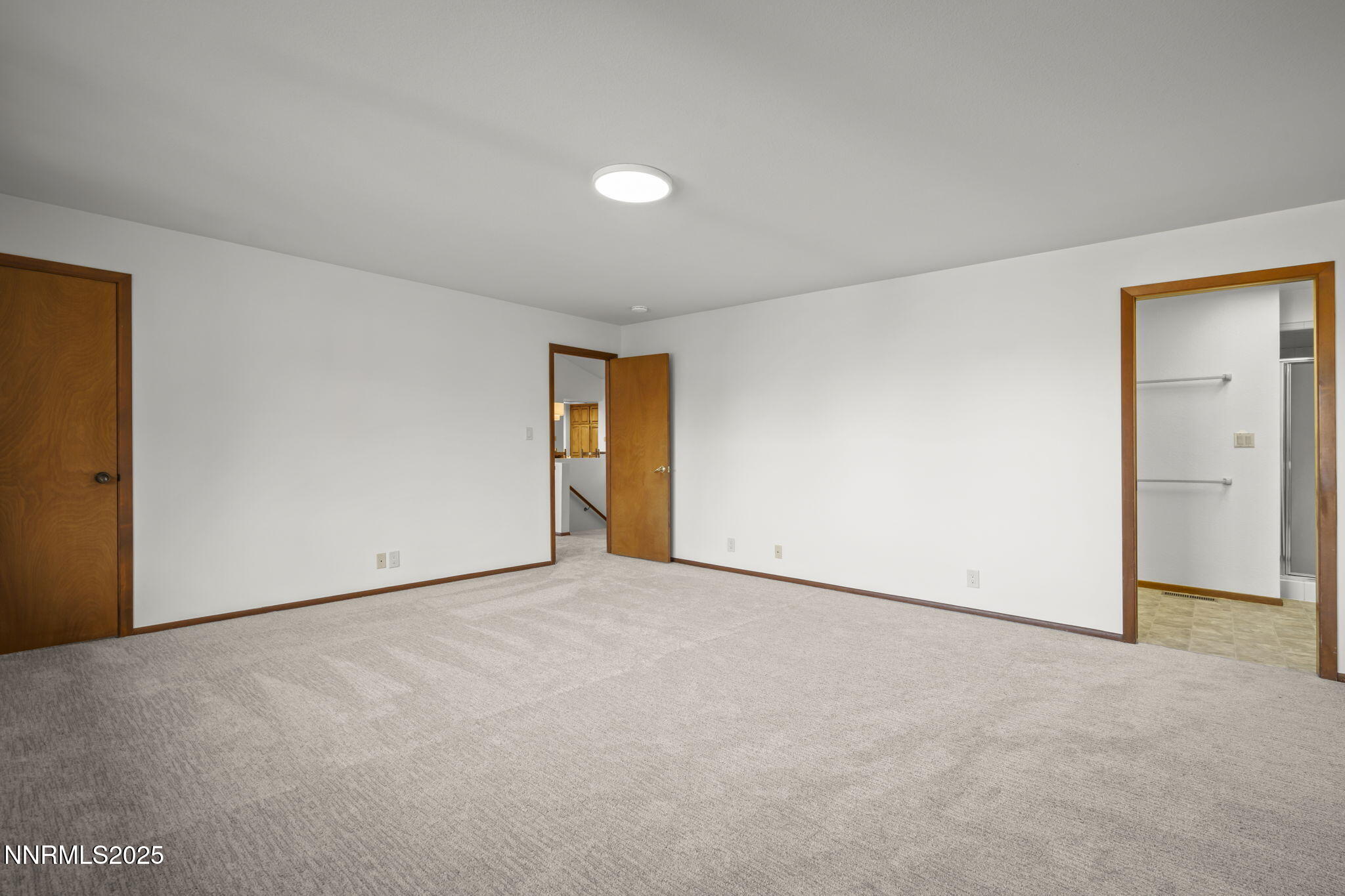 1443 Copper Point Circle Reno, NV 89519 - Photo 14 of 33 an empty room with a natural light