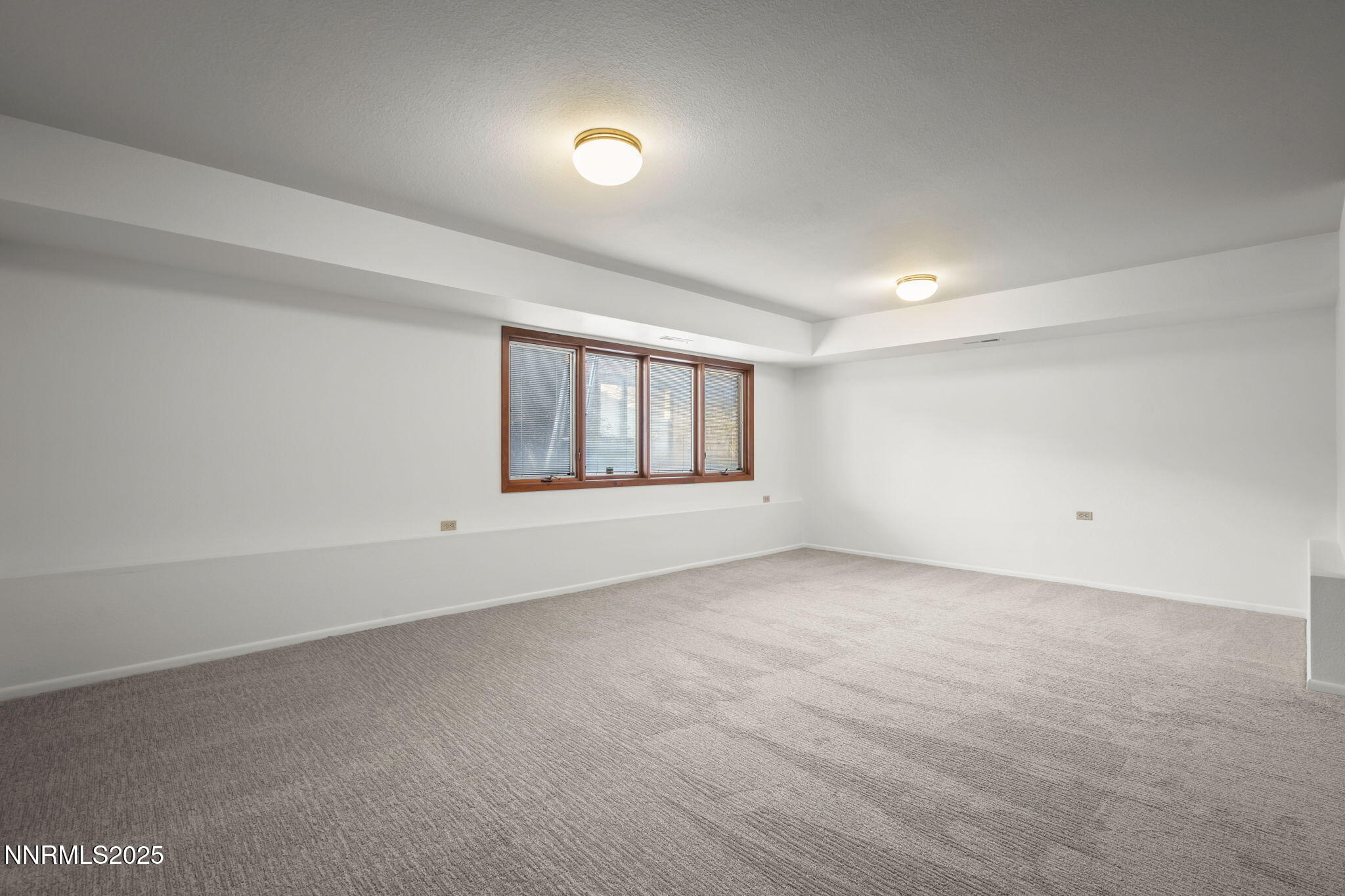 1443 Copper Point Circle Reno, NV 89519 - Photo 24 of 33 an empty room with a window