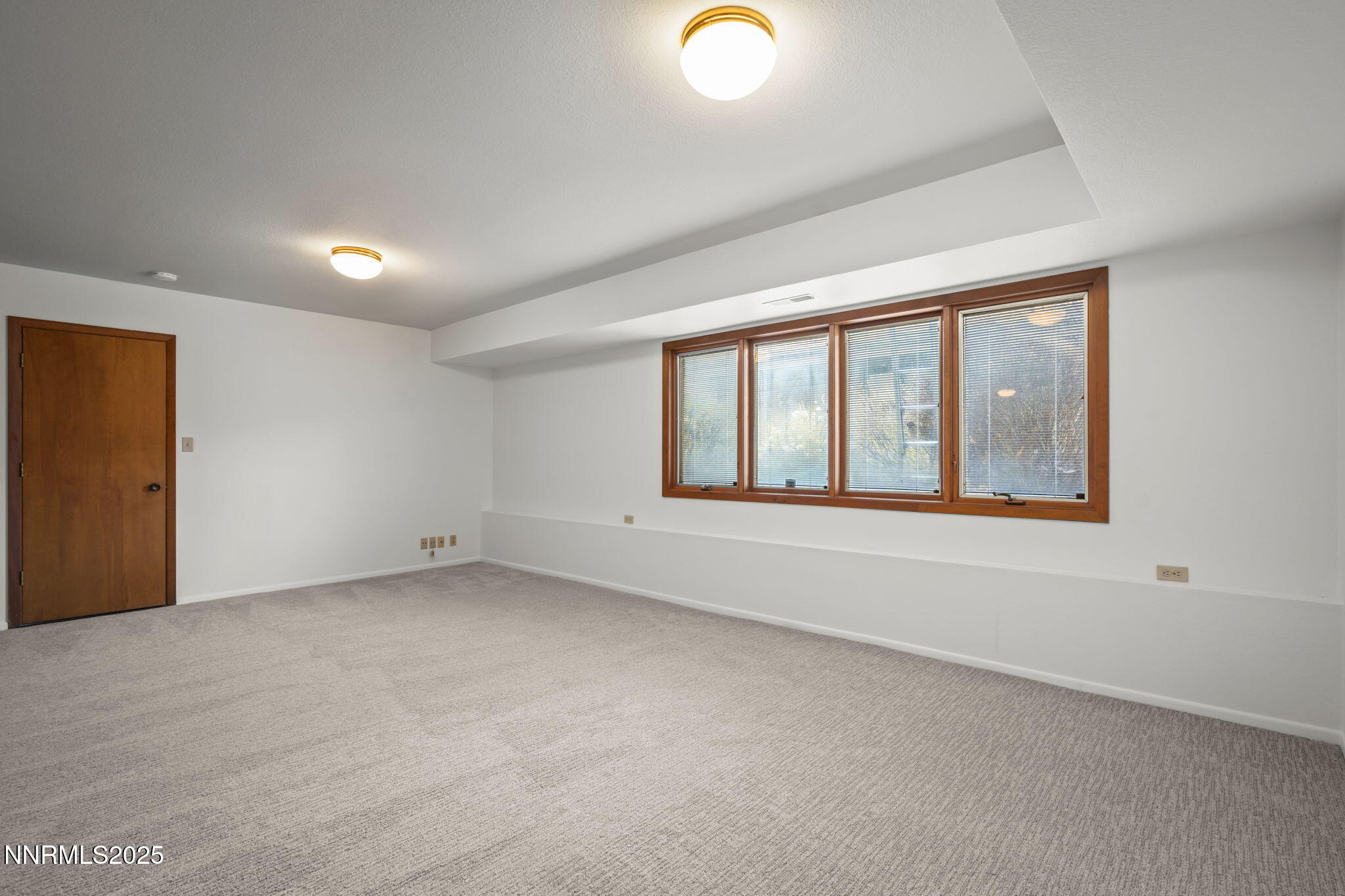 1443 Copper Point Circle Reno, NV 89519 - Photo 26 of 33 an empty room with windows