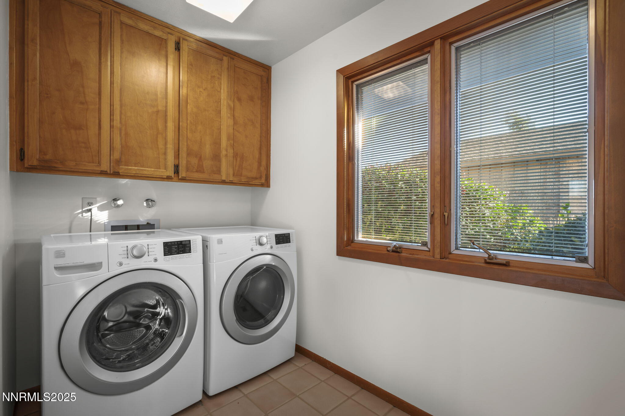 1443 Copper Point Circle Reno, NV 89519 - Photo 28 of 33 a utility room with dryer and washer