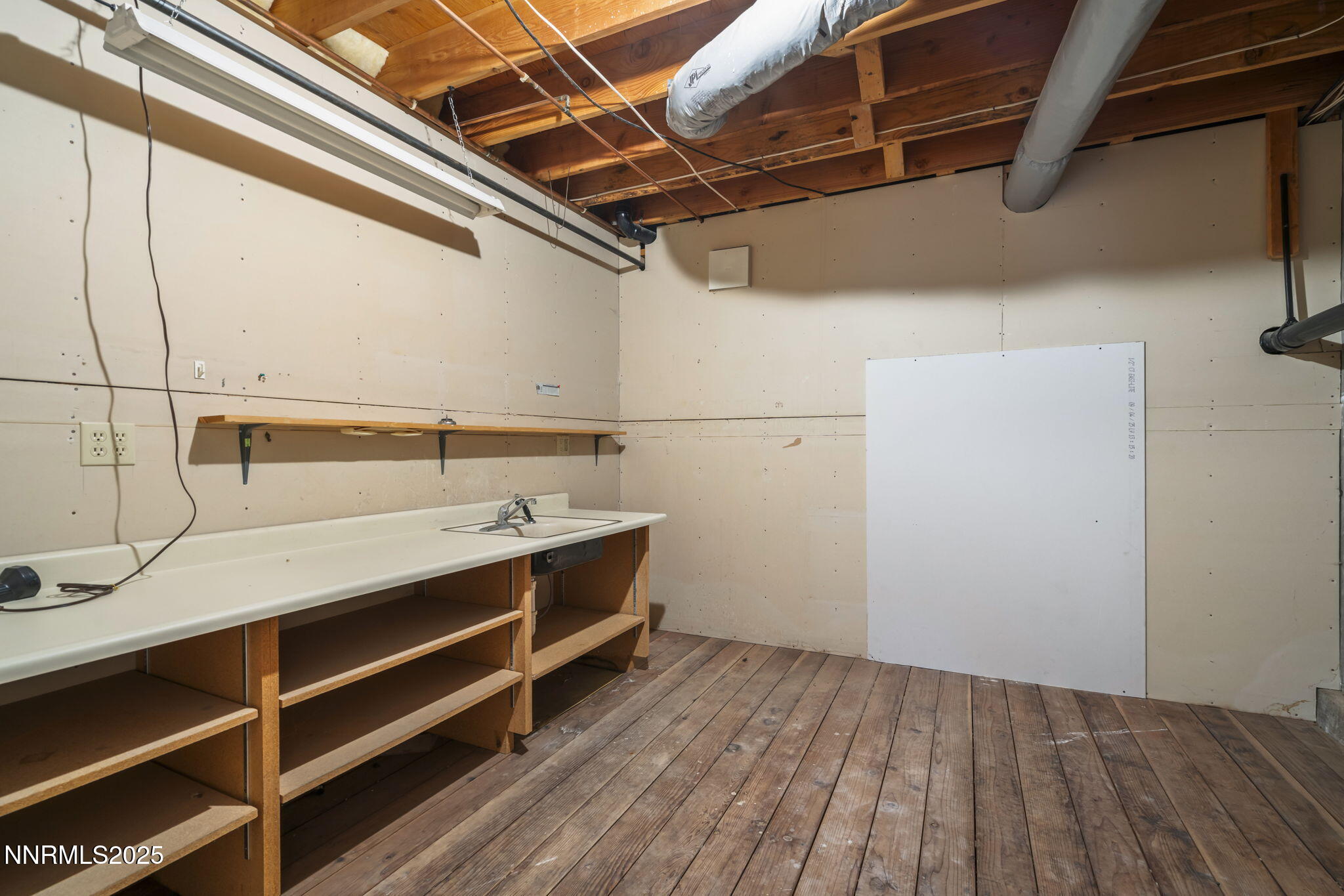 1443 Copper Point Circle Reno, NV 89519 - Photo 29 of 33 a view of a room with wooden floor