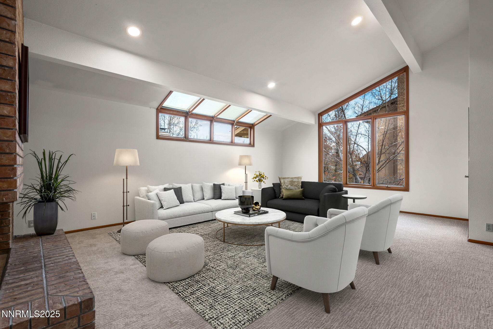 1443 Copper Point Circle Reno, NV 89519 - Photo 3 of 33 a living room with furniture and a large window