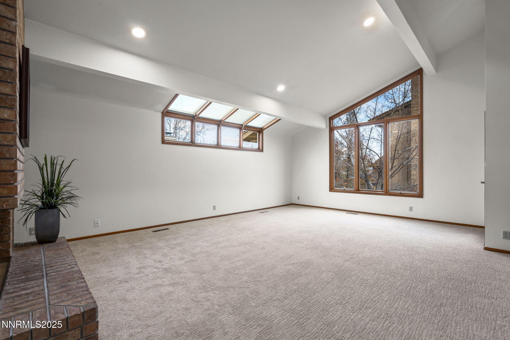 1443 Copper Point Circle Reno, NV 89519 - Photo 4 of 33 a view of an empty room with a window