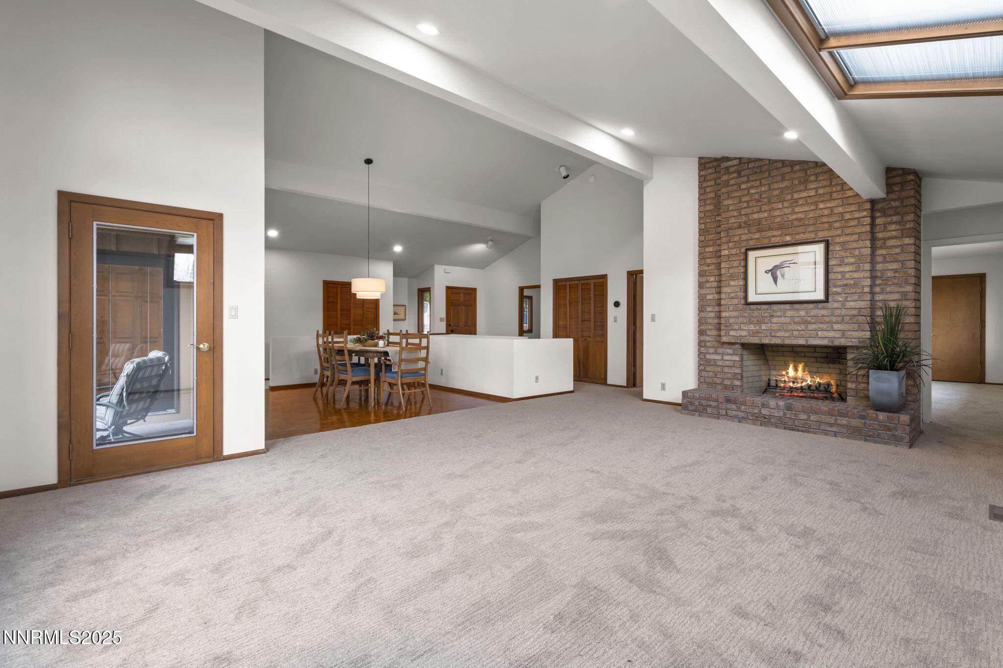 1443 Copper Point Circle Reno, NV 89519 - Photo 6 of 33 a living room with furniture and a fireplace