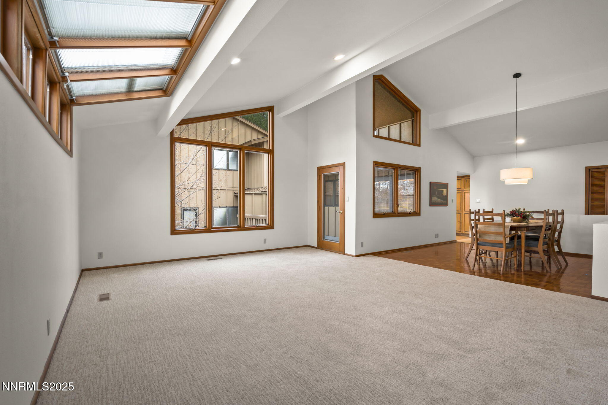 1443 Copper Point Circle Reno, NV 89519 - Photo 7 of 33 a view of a livingroom with furniture and a window
