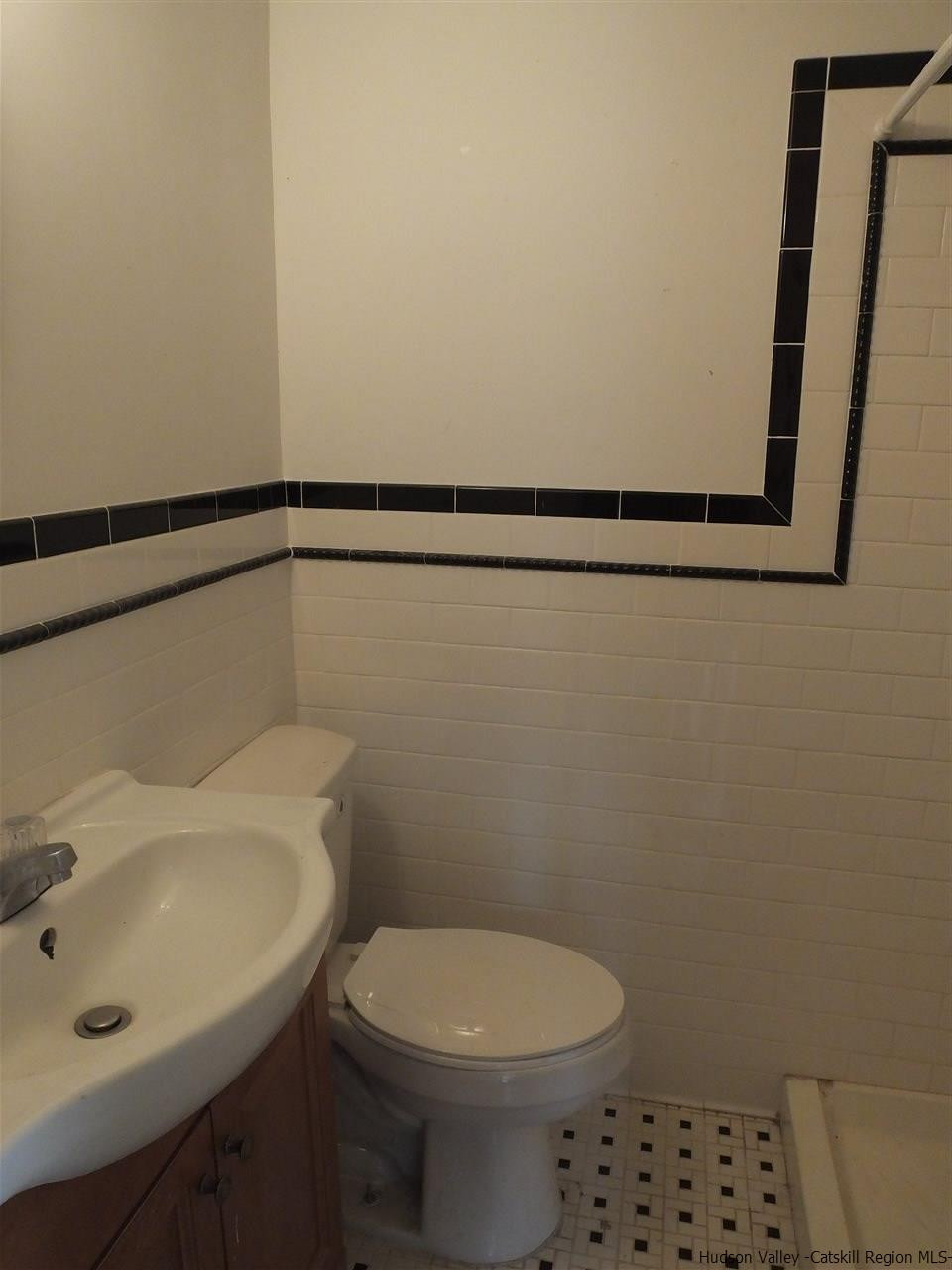 300 Vly Atwood Road Stone Ridge, NY 12484 - Photo 19 of 31 a bathroom with a sink a toilet and a mirror
