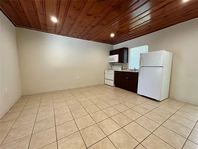 a view of kitchen and utility room