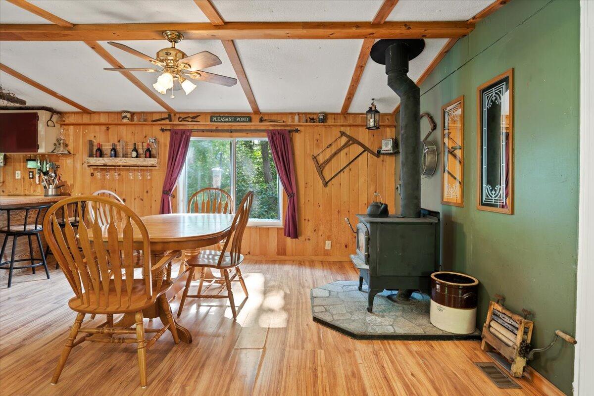 15 McLaughlin Road Turner, ME 04282 - Photo 11 of 45 Dining Area with Wood Stove