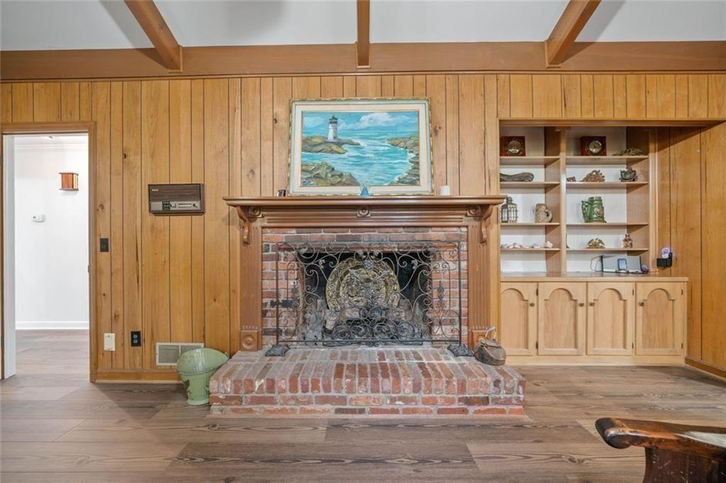 286 Hilton Way Canton, GA 30114 - Photo 20 of 59 a living room with furniture and a fireplace