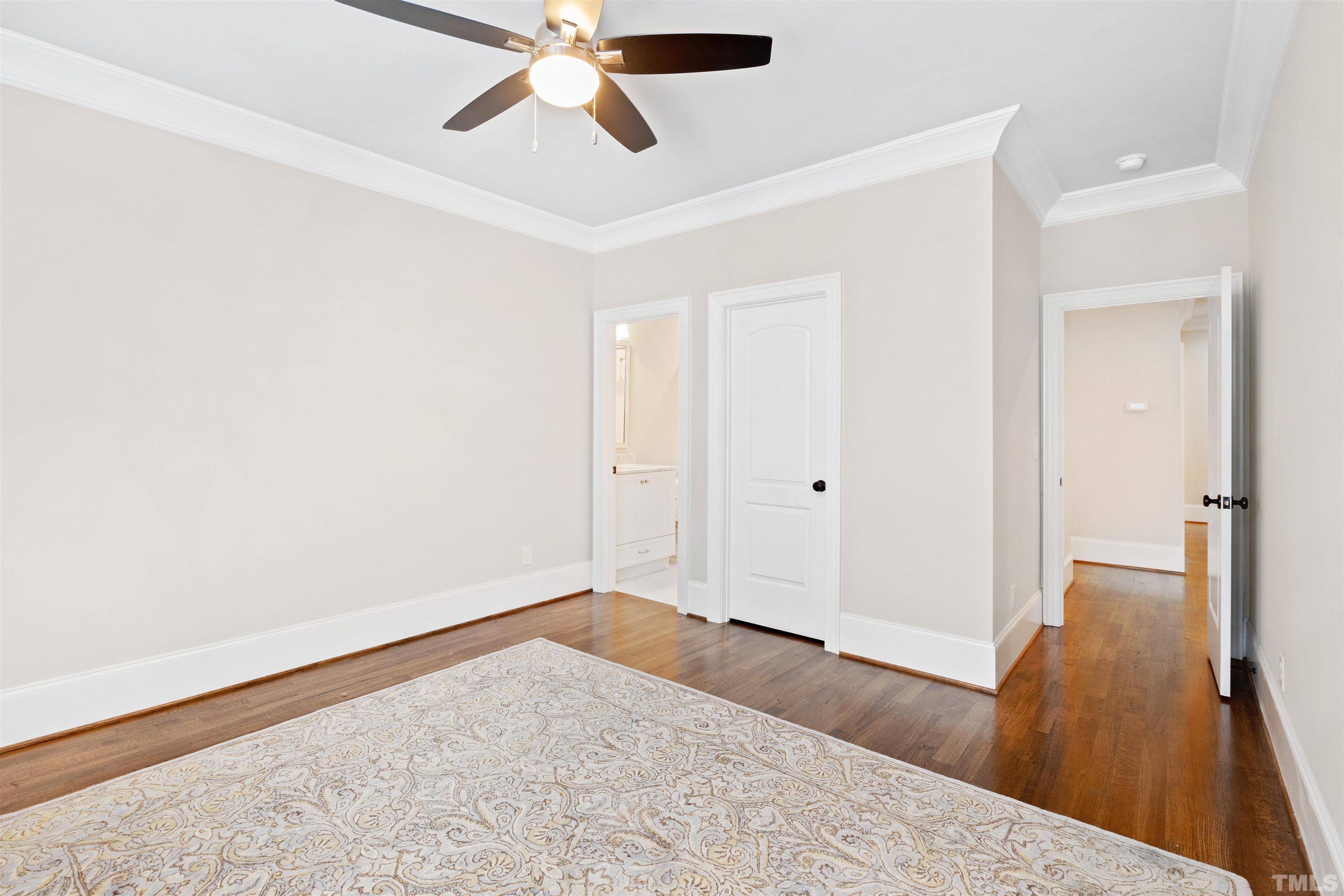 1231 Canterbury Road Raleigh, NC 27608 - Photo 54 of 67 a view of a room with wooden floor and bedroom
