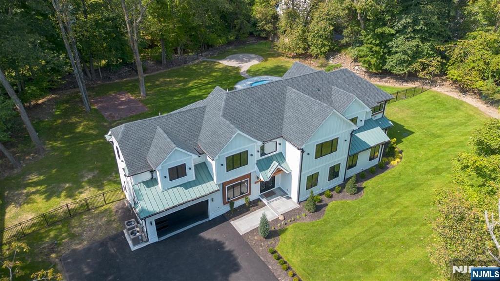 23 Brook Road Upper Saddle River, NJ 07458 - Photo 27 of 27 an aerial view of a house with a big yard