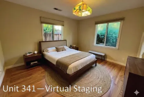 a kitchen with a sink cabinets and wooden floor