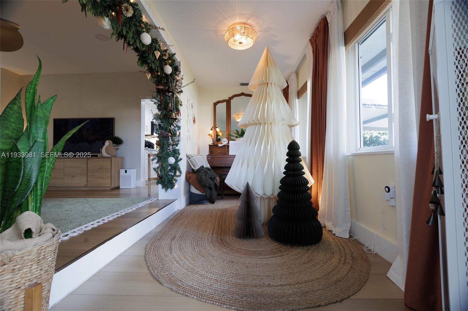 734 Northwest 75th Street Miami, FL 33150 - Photo 4 of 24 Front door entryway / Den