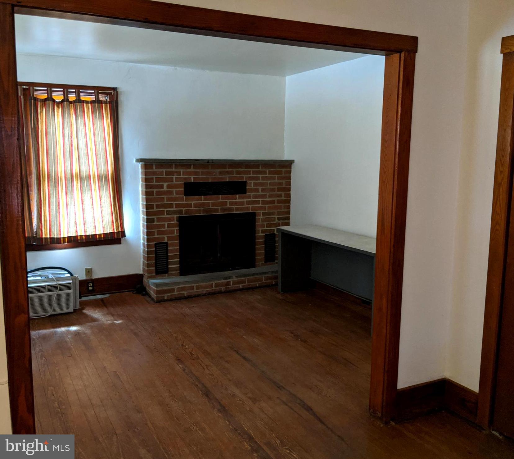 2209 Coon Road Biglerville, PA 17307 - Photo 24 of 33 Sitting Room 2/ Fireplace.