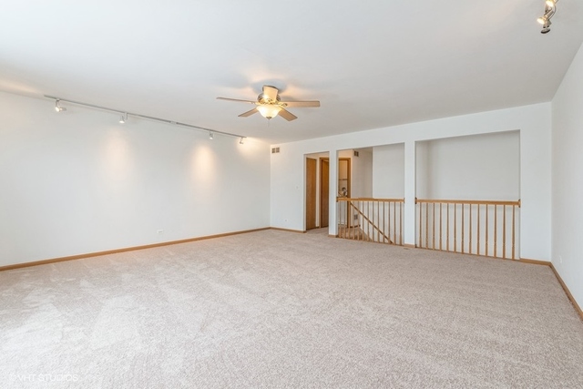 16136 Golf View Drive Lockport, IL 60441 - Photo 6 of 13 a view of an empty room with a window
