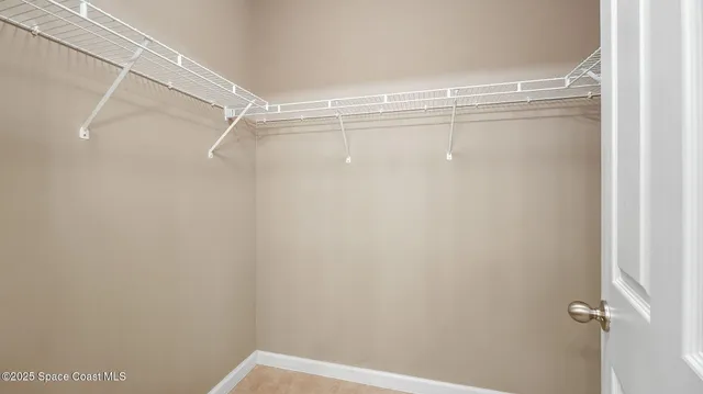 a bathroom with a shower and a toilet