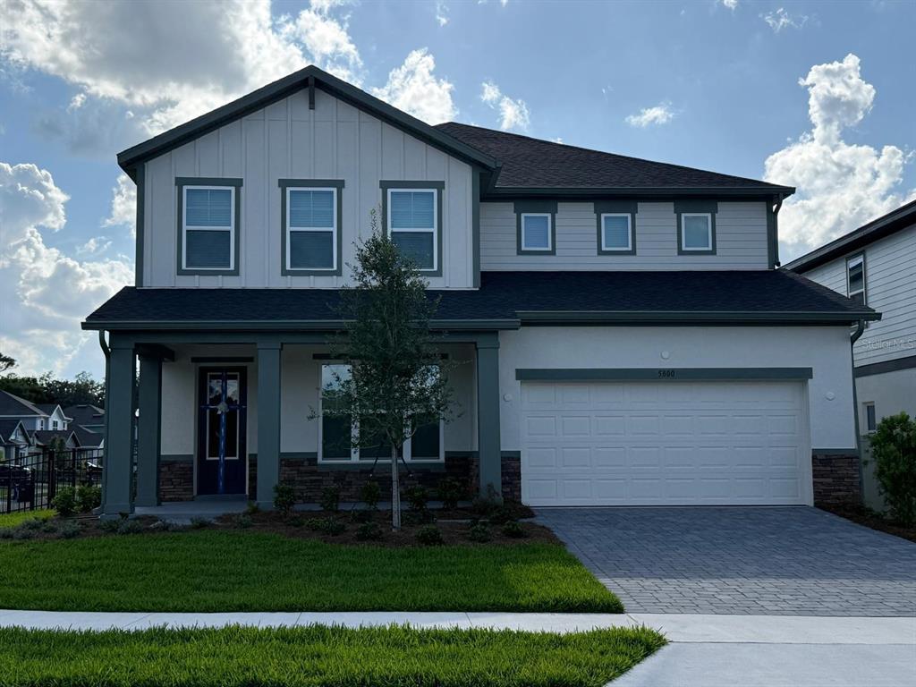 5800 Native Oak Street Mount Dora, FL 32757 - Photo 1 of 1 a front view of a house with a yard