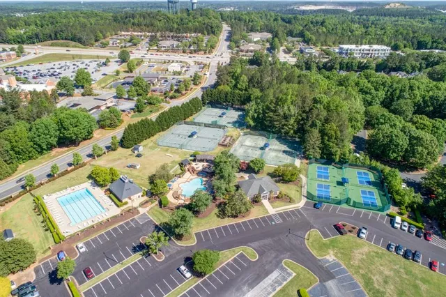 an aerial view of a city with lots of residential buildings