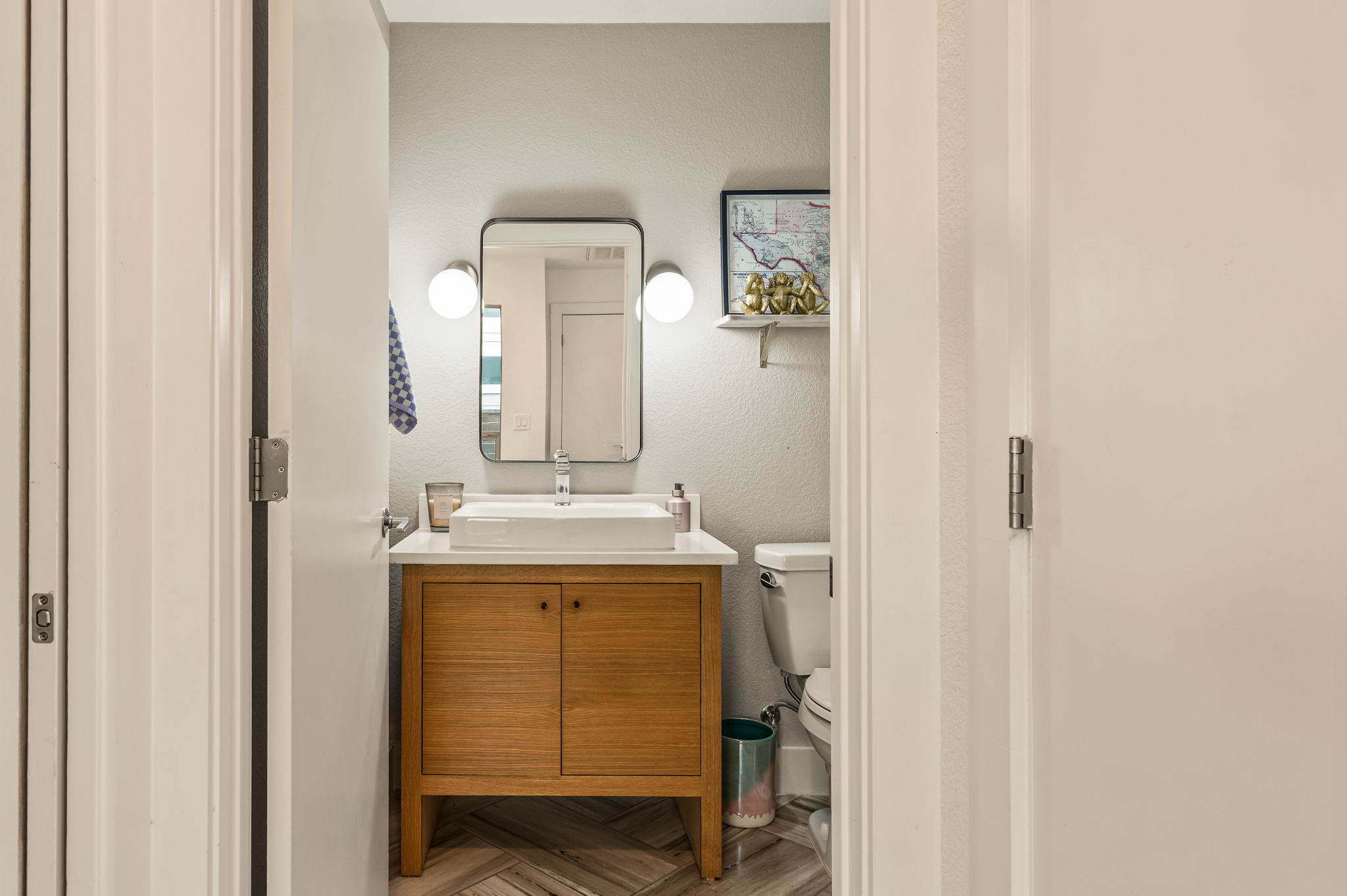 1124 Linden Street, Unit B Austin, TX 78702 - Photo 7 of 26 Bathroom with vanity, parquet flooring, and a textured wall