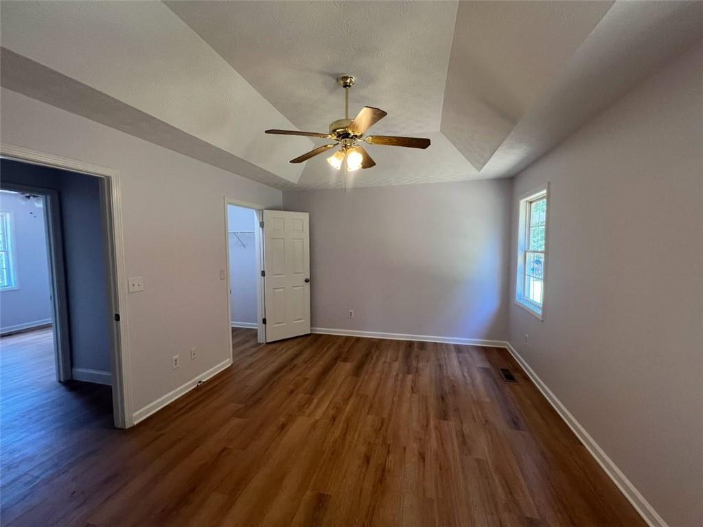 89 Farm Brook Lane Dallas, GA 30157 - Photo 13 of 42 wooden floor in an empty room with a window