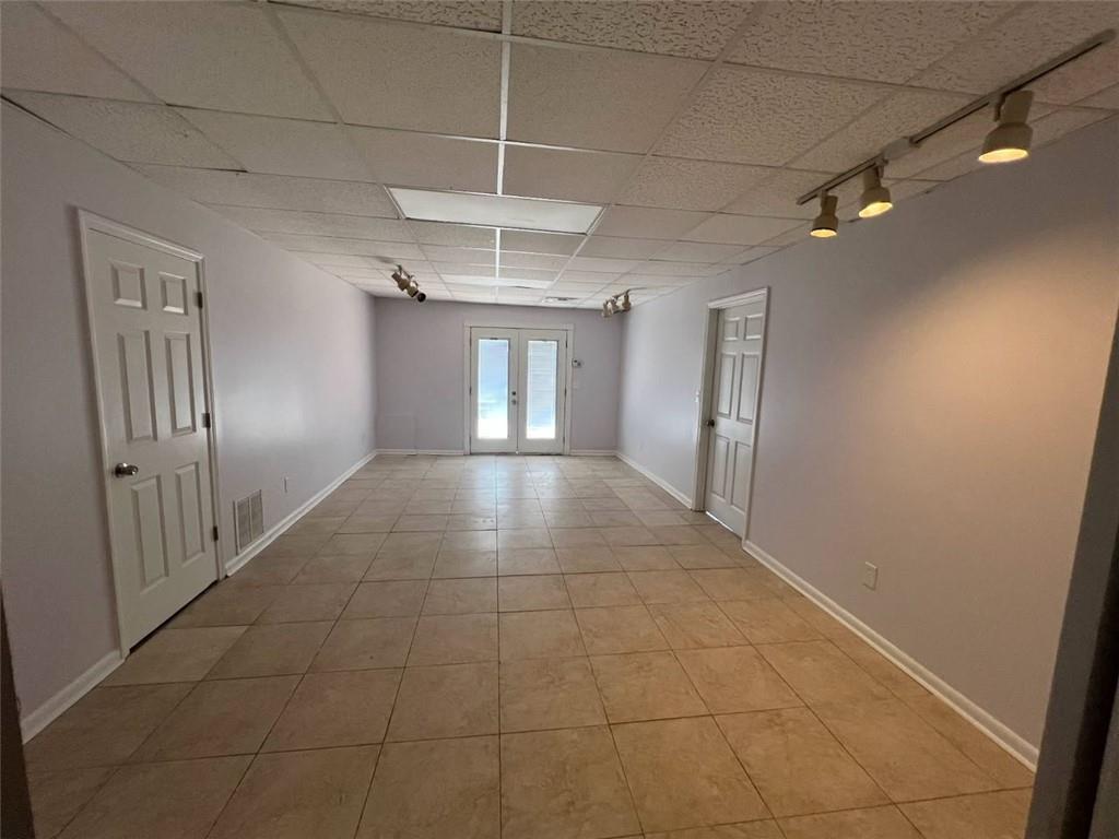 89 Farm Brook Lane Dallas, GA 30157 - Photo 31 of 42 a view of a hallway with a chandelier