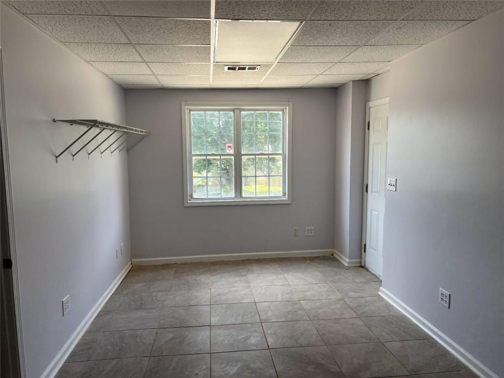 89 Farm Brook Lane Dallas, GA 30157 - Photo 32 of 42 a view of an empty room with a window