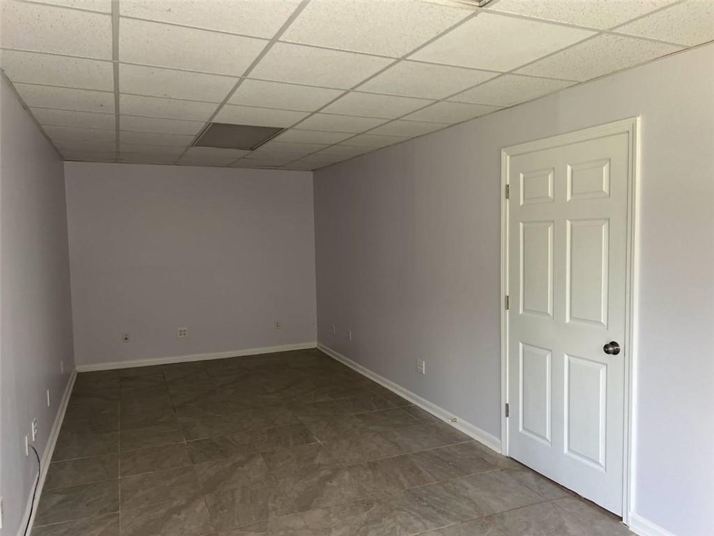 89 Farm Brook Lane Dallas, GA 30157 - Photo 33 of 42 an empty room with a empty space and a window