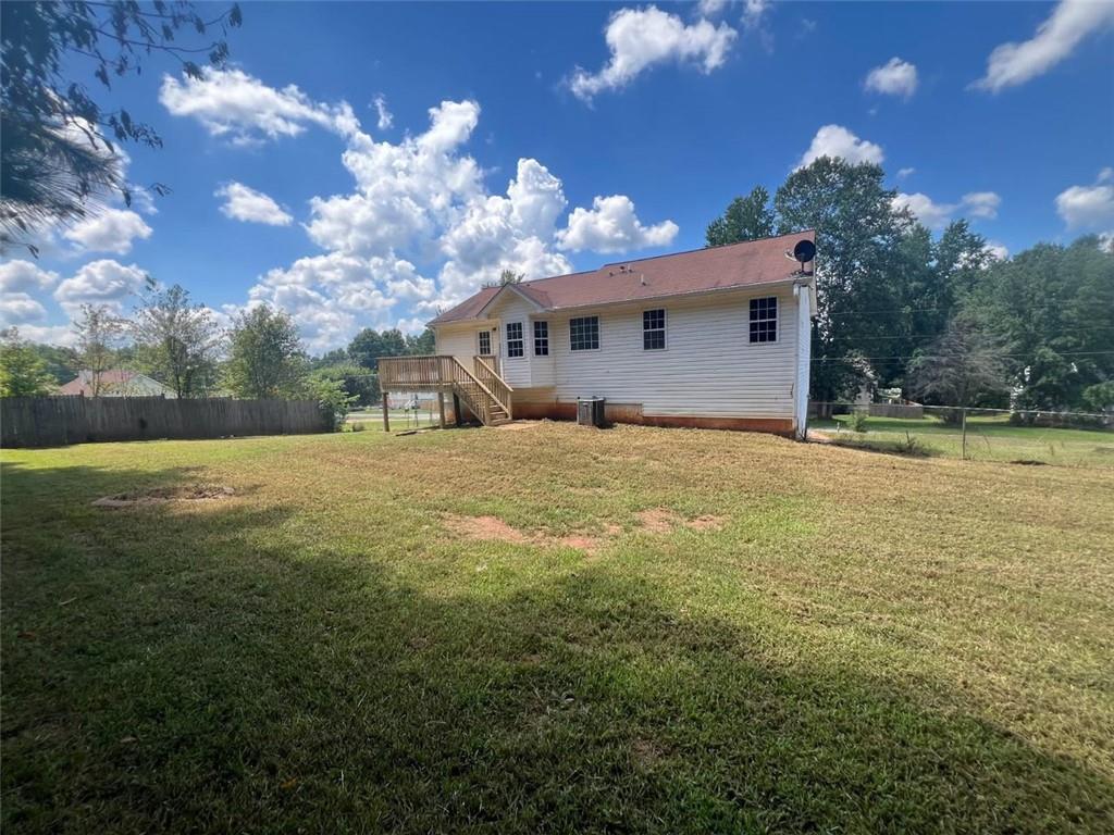 89 Farm Brook Lane Dallas, GA 30157 - Photo 37 of 42 a view of a house with a yard