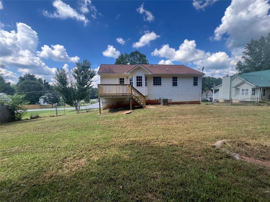 89 Farm Brook Lane Dallas, GA 30157 - Photo 38 of 42 a view of a house with a yard