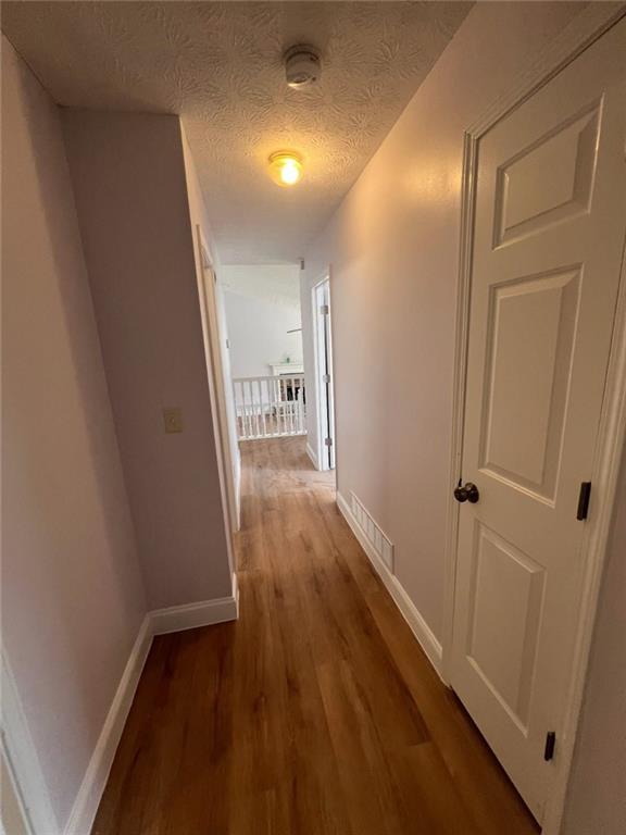 89 Farm Brook Lane Dallas, GA 30157 - Photo 10 of 42 a view of hallway with wooden floor