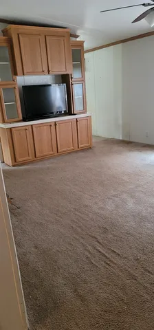 a view of storage and utility room with stairs