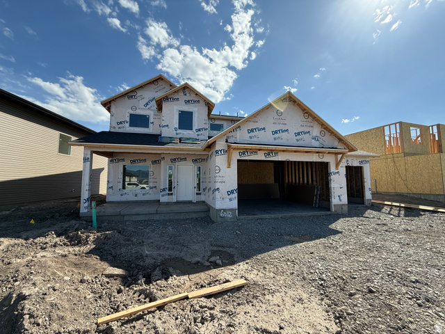 3318 South 1000 West Logan, UT 84321 - Photo 2 of 12 New construction property featuring a two-story design with a covered front entry