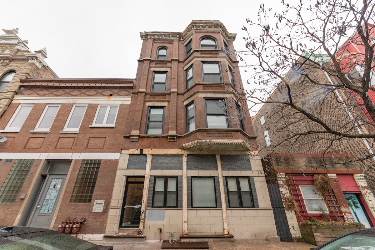1907 South Racine Avenue, Unit 4F Chicago, IL 60608 - Photo 1 of 18 a view of a large building