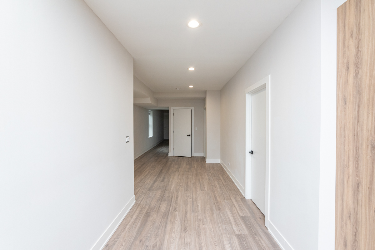 1907 South Racine Avenue, Unit 4F Chicago, IL 60608 - Photo 14 of 18 a view of a hallway with wooden floor