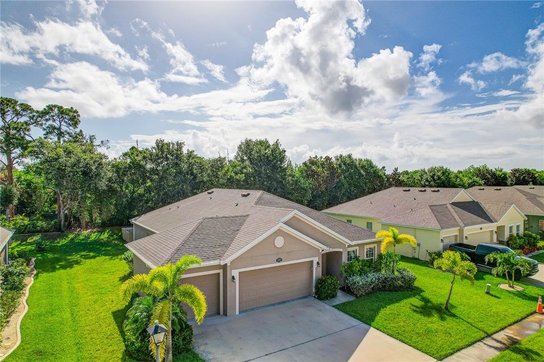 5997 Ridge Lake Circle Vero Beach, FL 32967 - Photo 3 of 36 an aerial view of a house