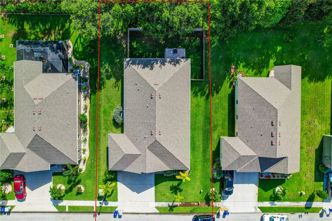 5997 Ridge Lake Circle Vero Beach, FL 32967 - Photo 35 of 36 an aerial view of a house