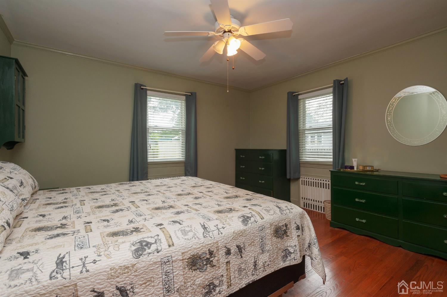 38 Greenbrook Road Middlesex, NJ 08846 - Photo 14 of 18 a bedroom with a bed and a dresser