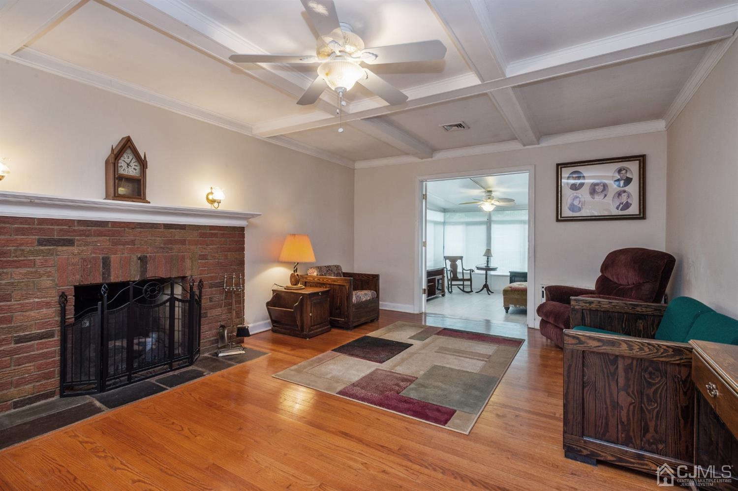 38 Greenbrook Road Middlesex, NJ 08846 - Photo 3 of 18 a living room with furniture and a fireplace