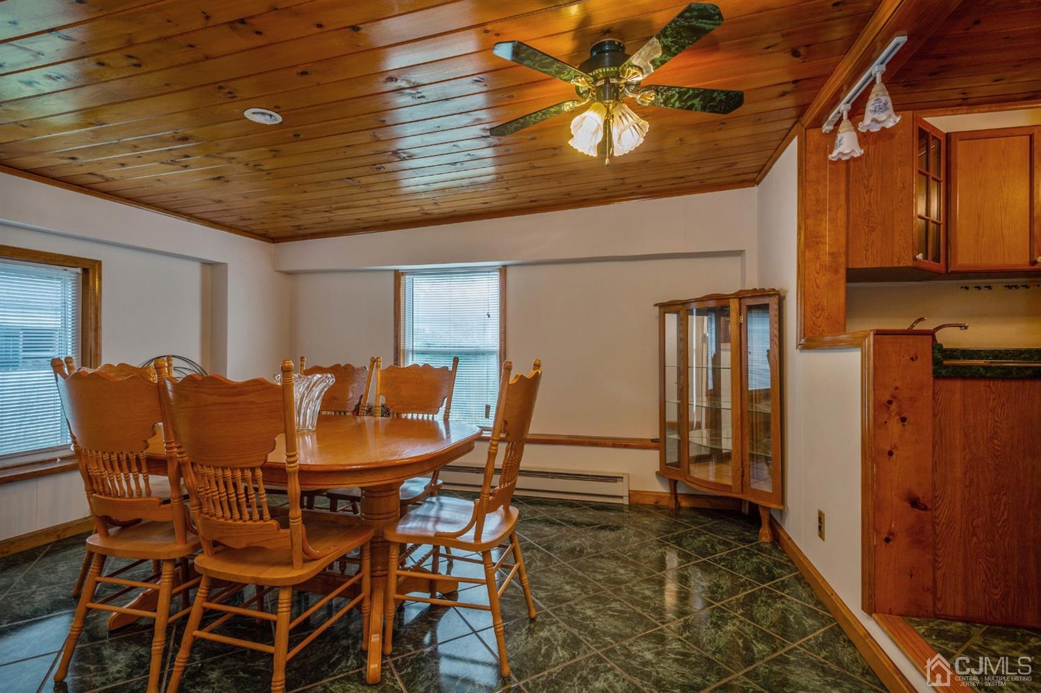 38 Greenbrook Road Middlesex, NJ 08846 - Photo 9 of 18 a dining room with furniture and window