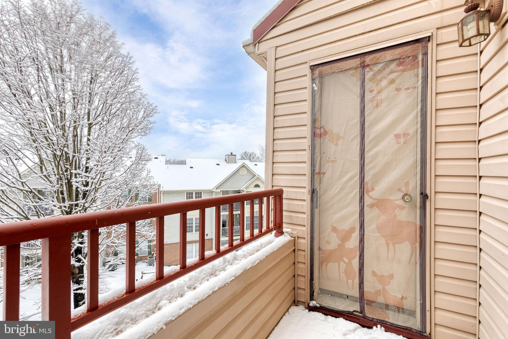 8008 Valley Manor Road, Unit 3B Owings Mills, MD 21117 - Photo 19 of 19 a view of a balcony with yard