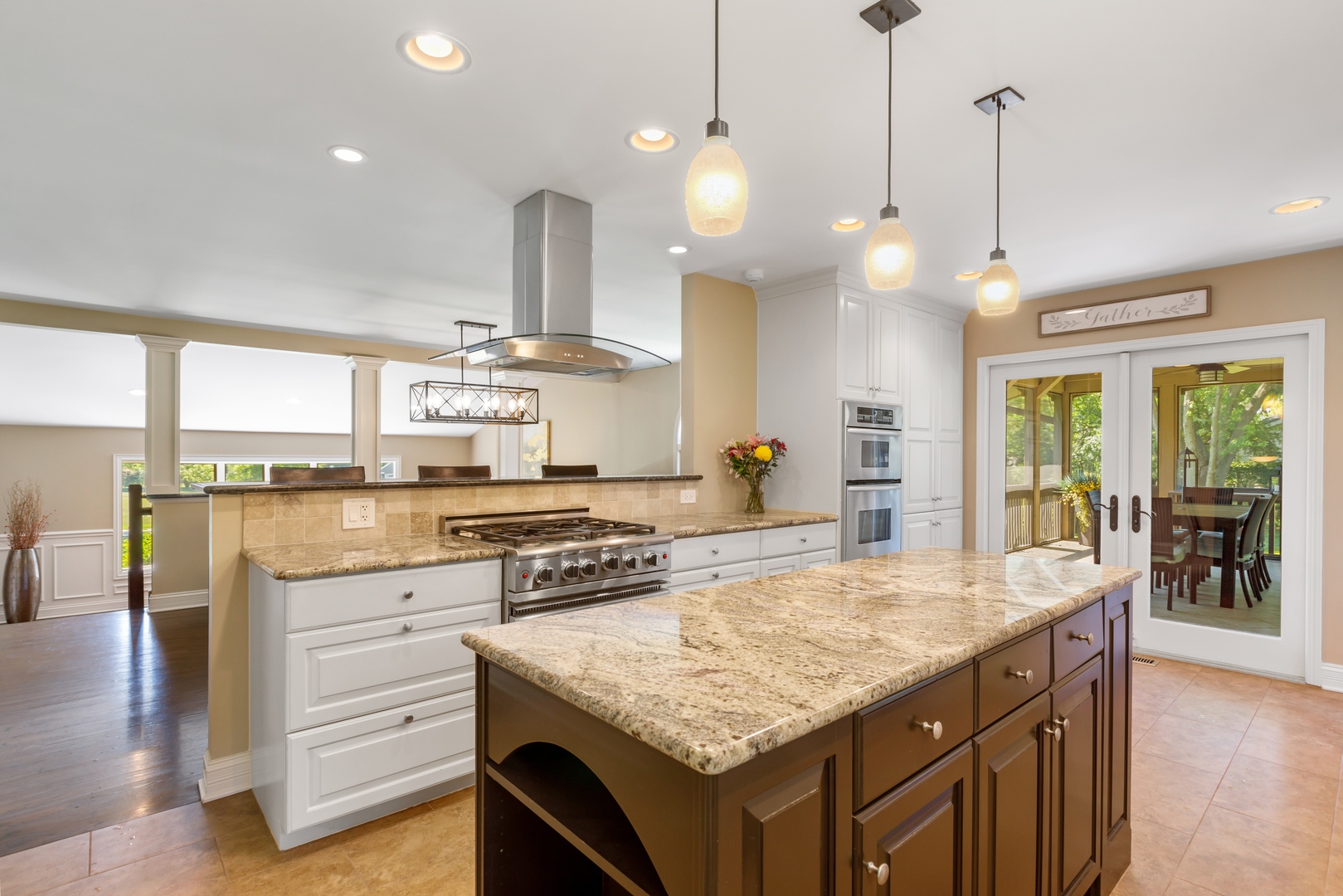 800 Sterling Road Inverness, IL 60067 - Photo 3 of 43 a kitchen with a stove and a wooden floor