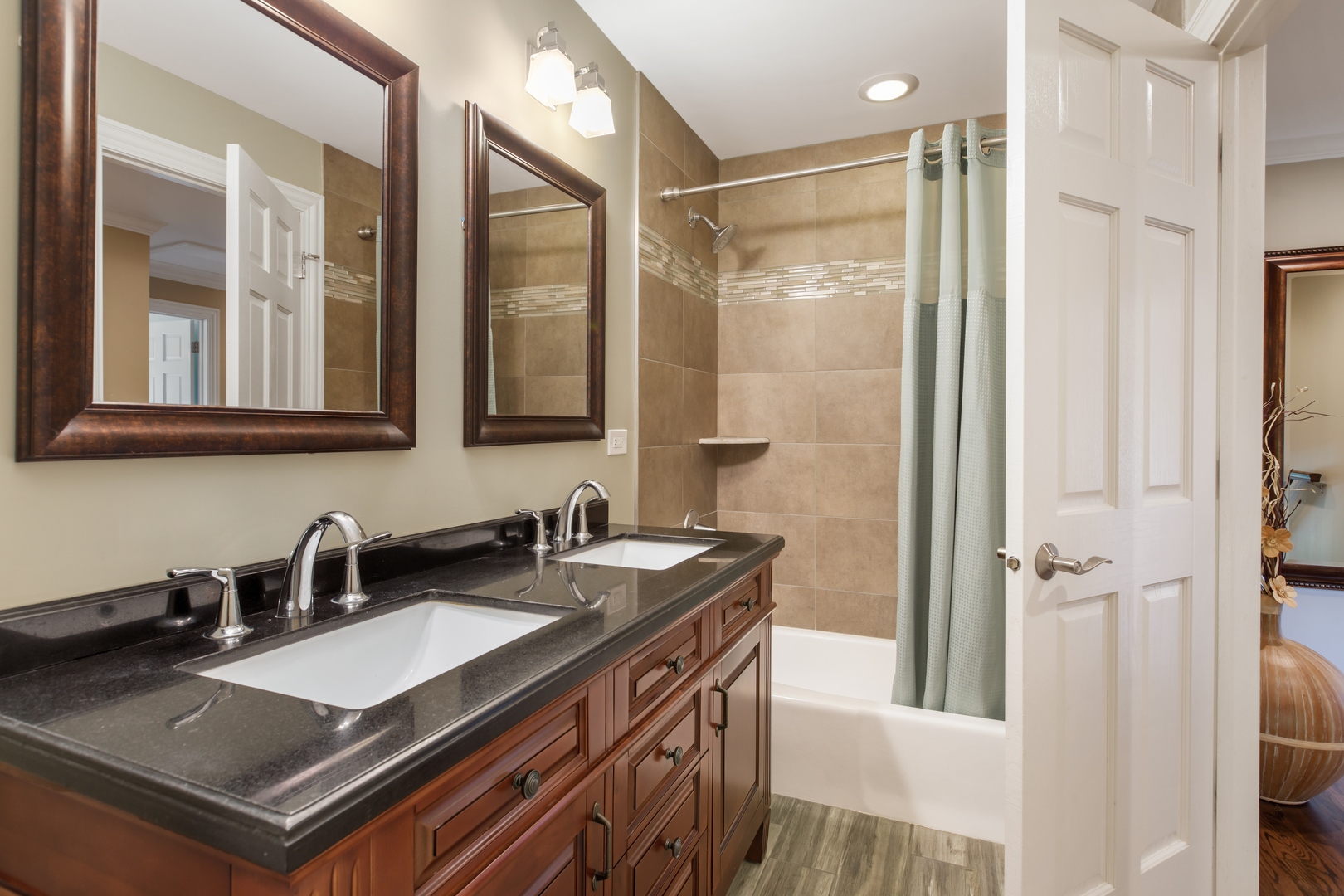 800 Sterling Road Inverness, IL 60067 - Photo 24 of 43 a bathroom with a sink and a mirror