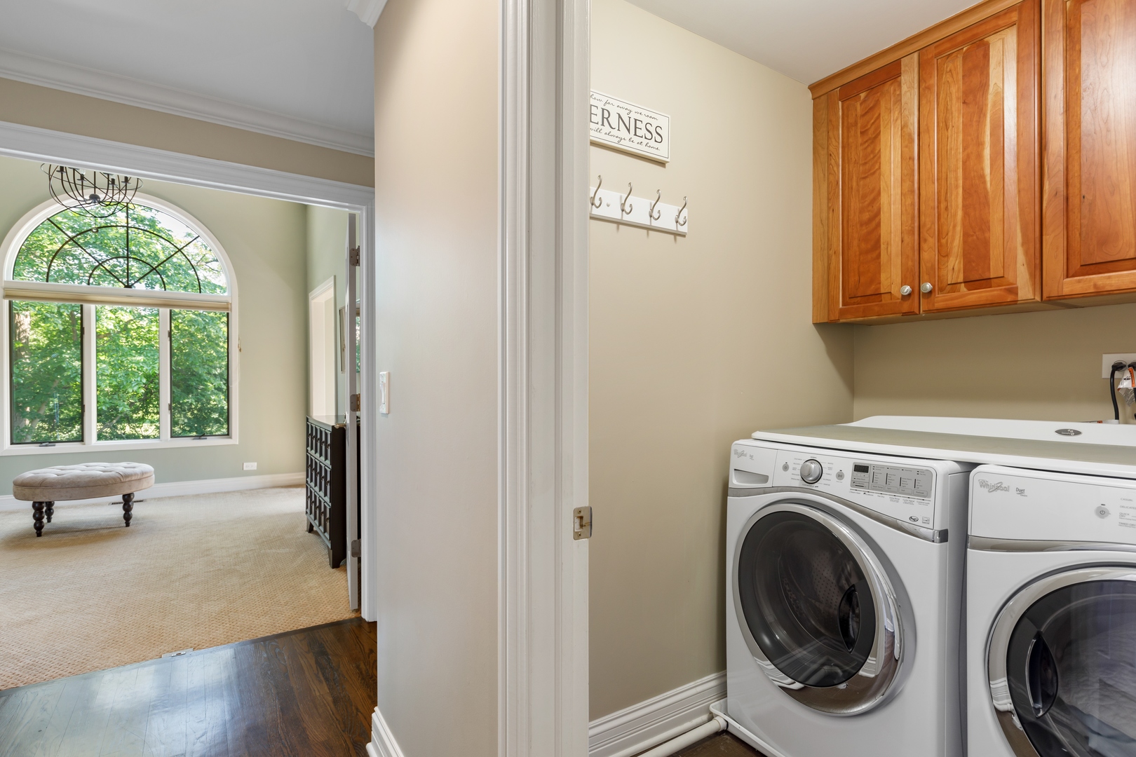 800 Sterling Road Inverness, IL 60067 - Photo 27 of 43 a view of a hallway with washer and dryer