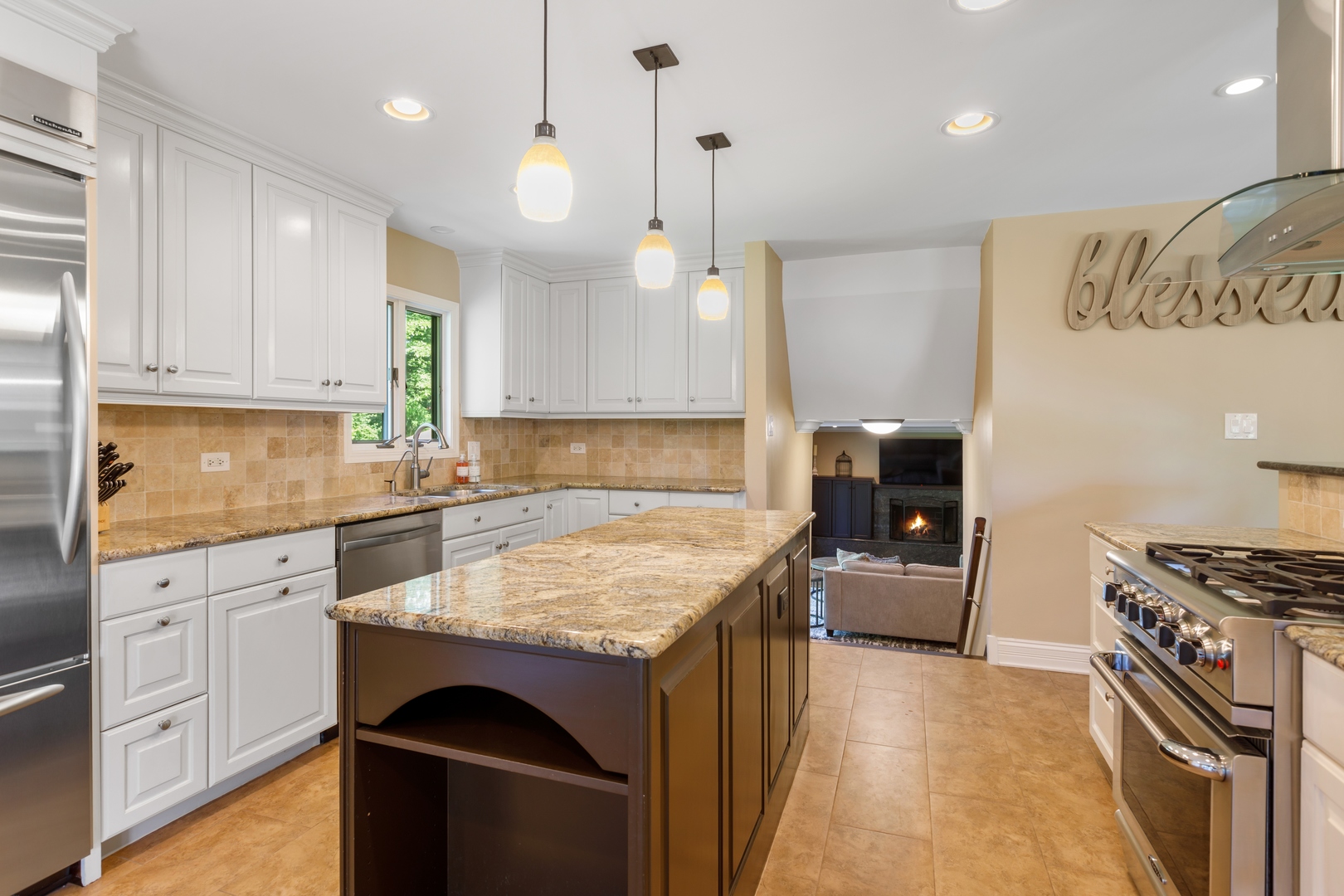 800 Sterling Road Inverness, IL 60067 - Photo 4 of 43 a kitchen with granite countertop a sink stove and cabinets