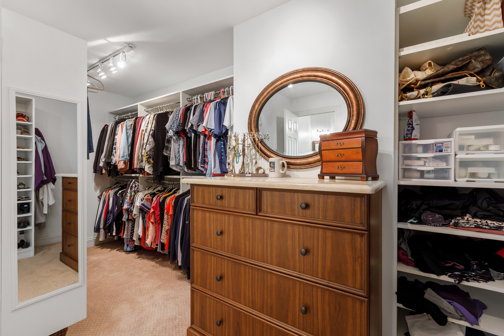 800 Sterling Road Inverness, IL 60067 - Photo 31 of 43 a view of walk in closet with clothes and shoes