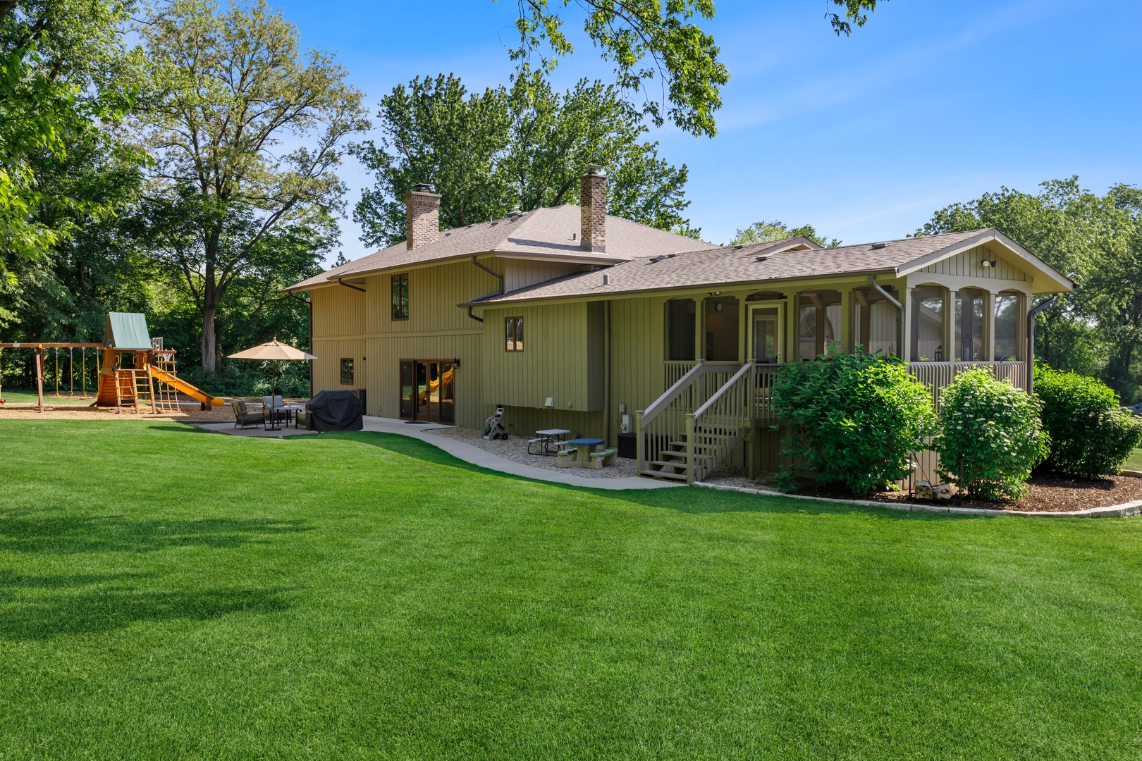 800 Sterling Road Inverness, IL 60067 - Photo 40 of 43 a view of a house with backyard porch and sitting area