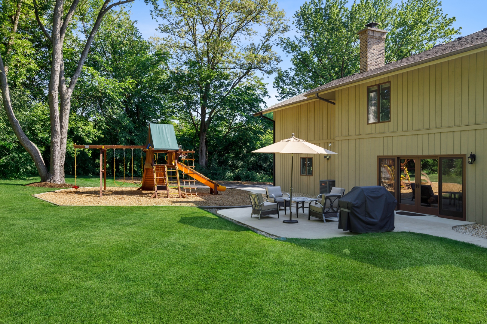 800 Sterling Road Inverness, IL 60067 - Photo 42 of 43 a view of a chair and table in the garden