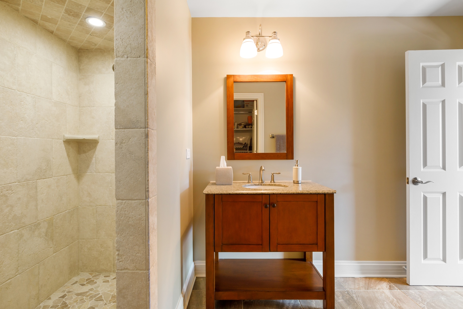 800 Sterling Road Inverness, IL 60067 - Photo 7 of 43 a bathroom with a sink and a mirror