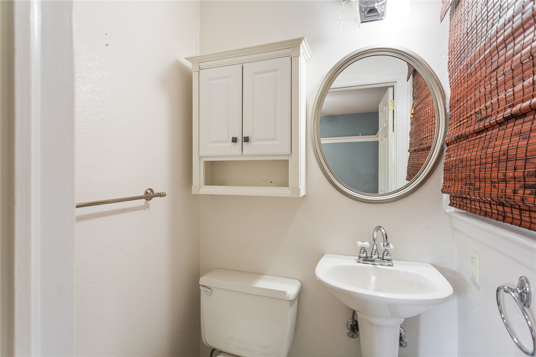 202 Keowee Trail Seneca, SC 29672 - Photo 23 of 35 This bright bathroom features a pedestal sink and convenient overhead storage.